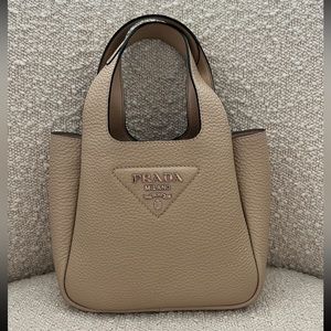 Brand New Never Worn Prada Hobo bag small, new with tags and dust bag